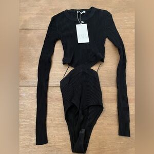 Zara long sleeve body suit, never been worn.
